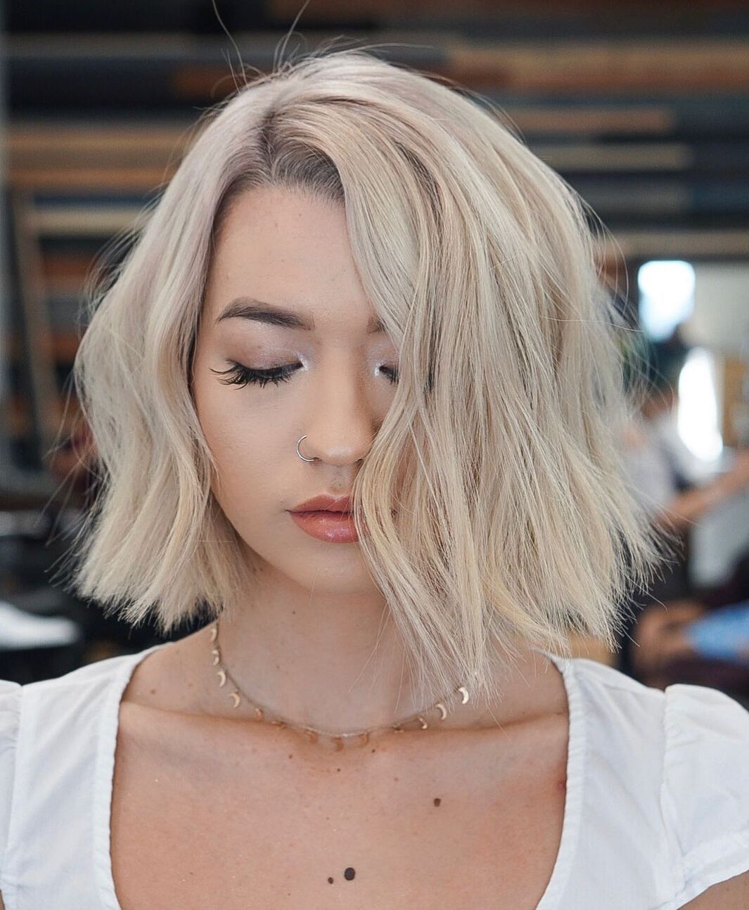 Disconnected Asymmetrical Light Blonde Bob